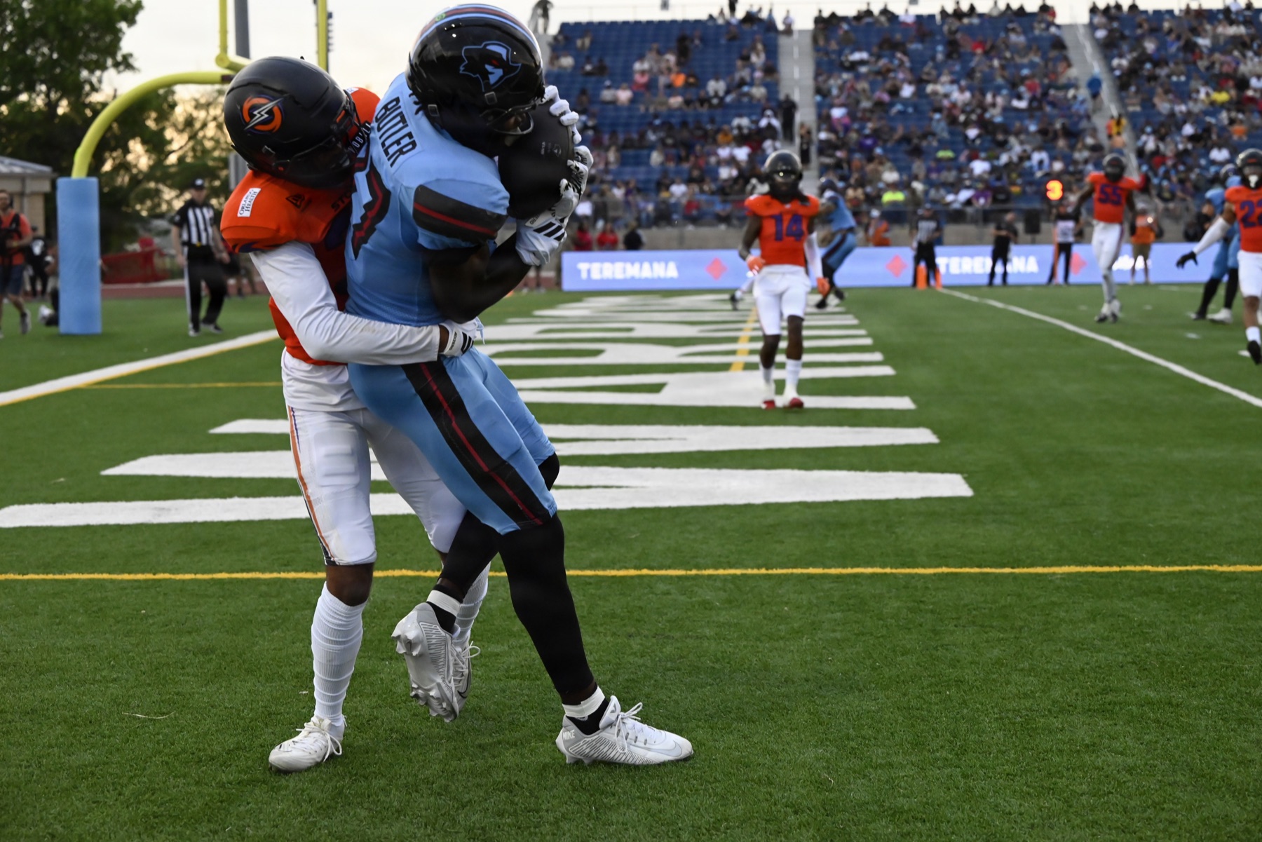 A United Football League player catches the ball at the goal line during a 2026 game at Fort Hood